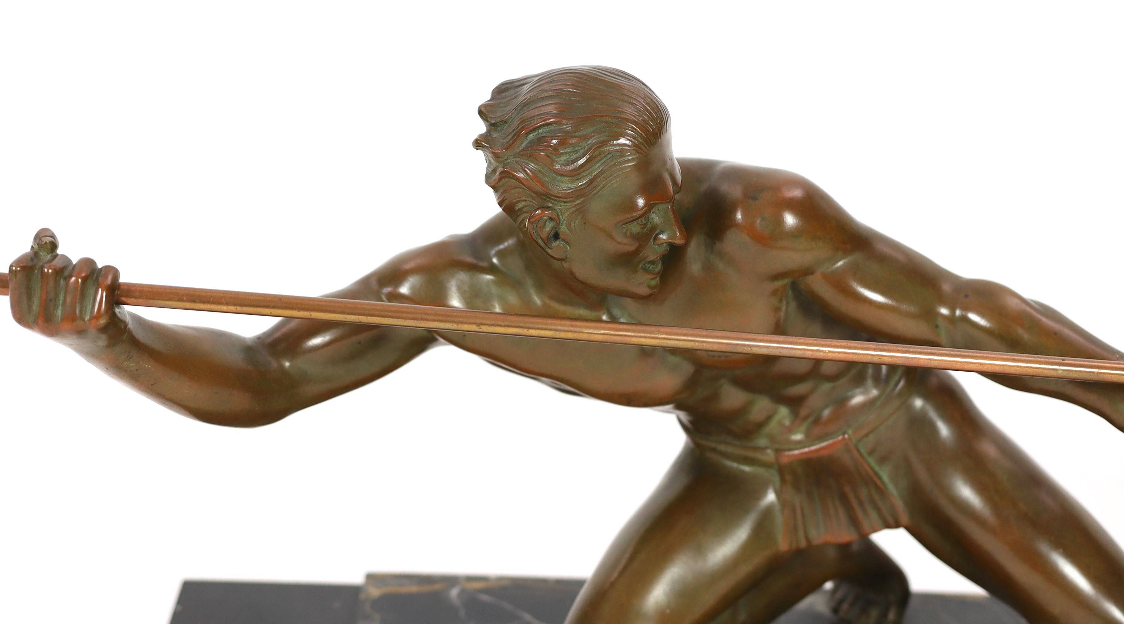 Pierre Joseph Hugonnet. A 1930s French Art Deco bronze model of a spear thrower, length 90cm, height 38cm